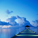 A dock at sunset on White Sands Island in the Maldives.